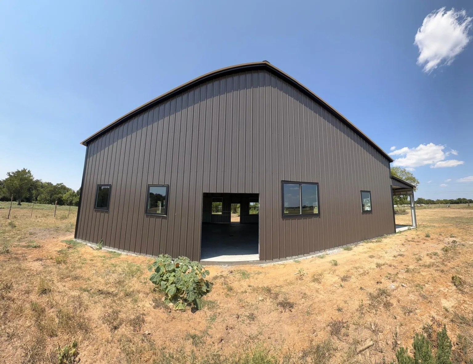Metal building project with installed windows